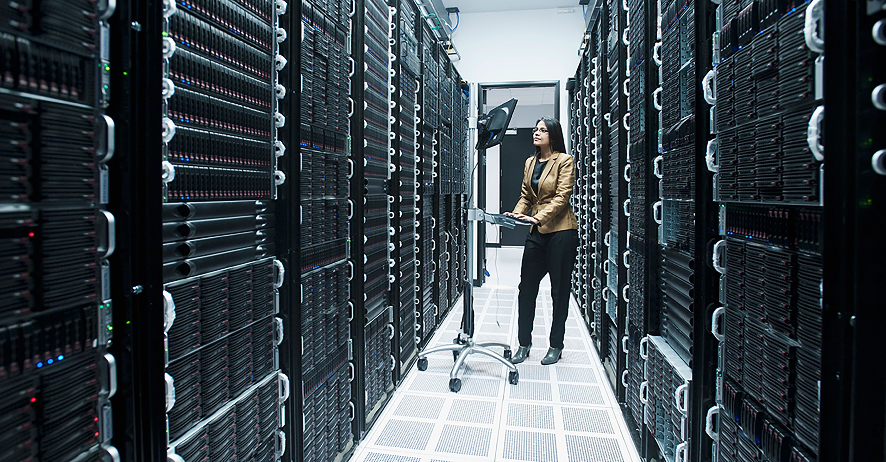 A woman working in a data center